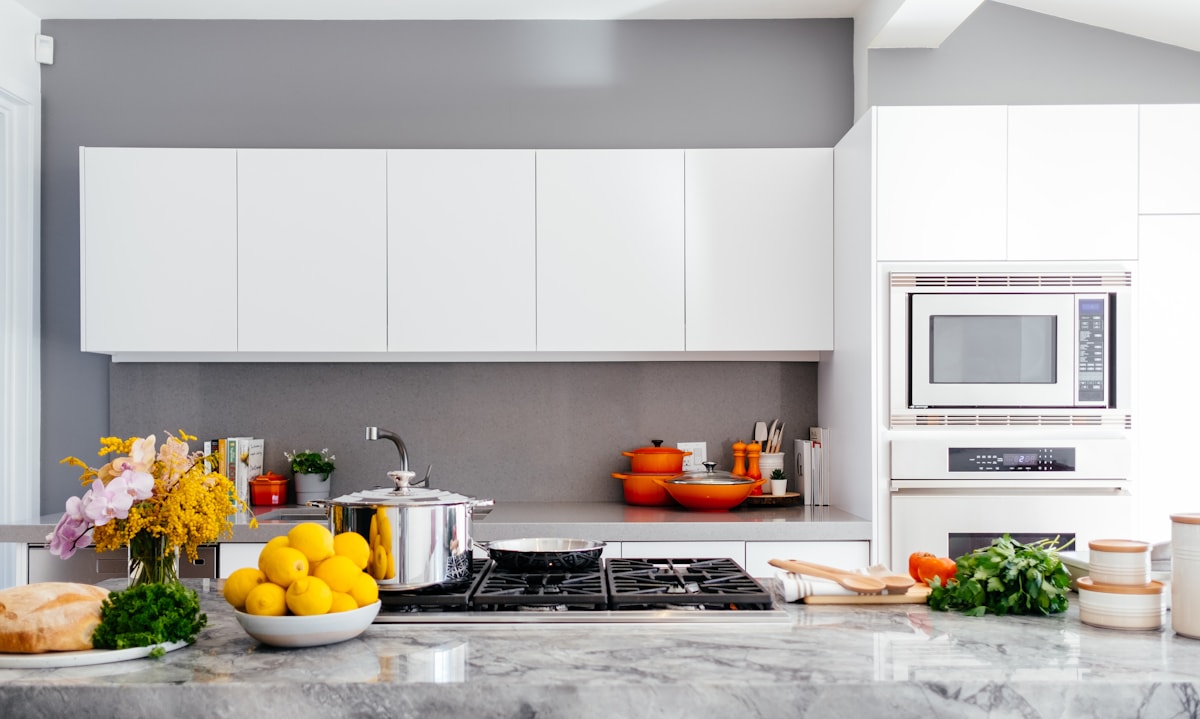 Bright, clean kitchen and dining space with sunlight